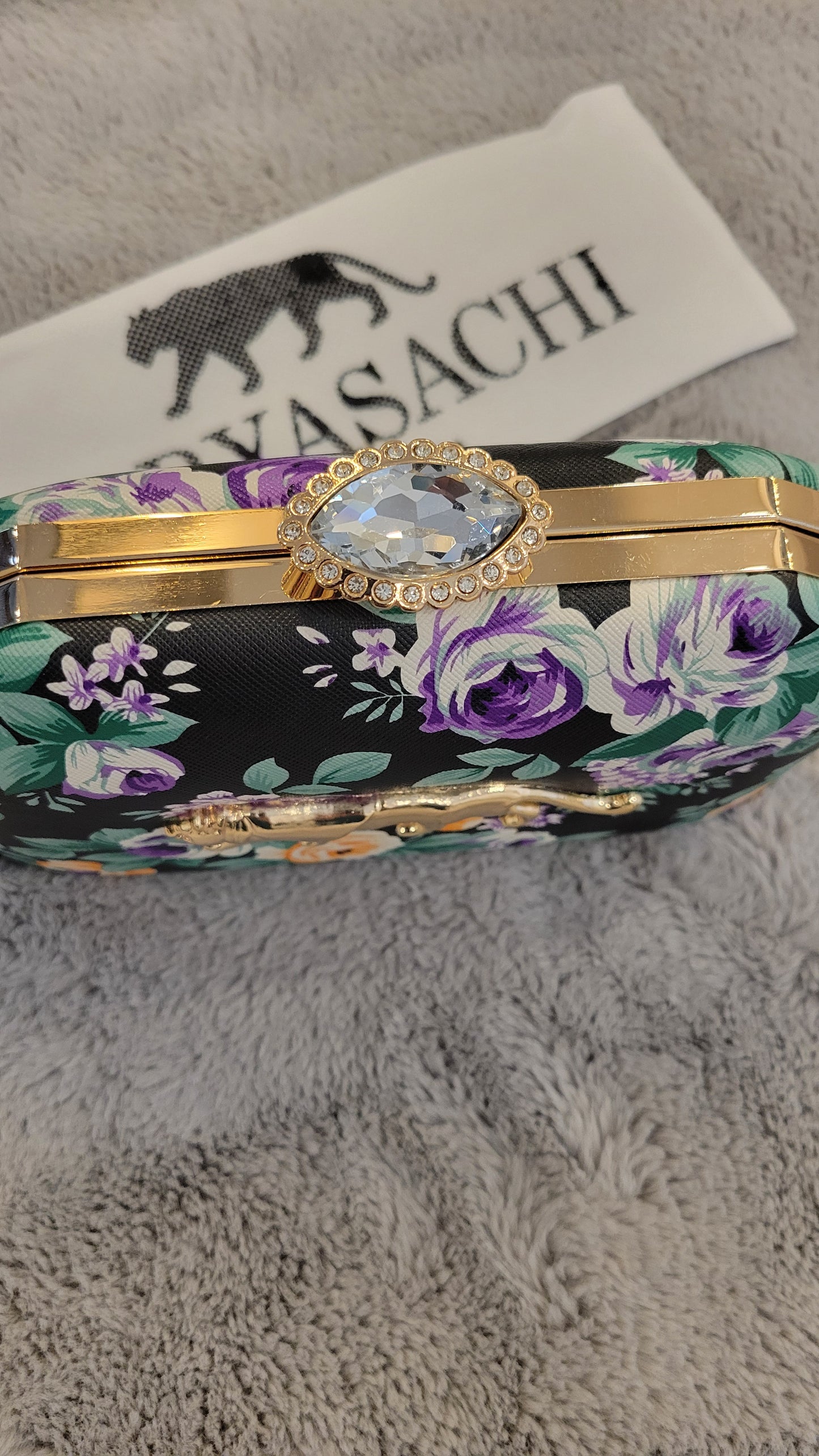 Black floral clutch