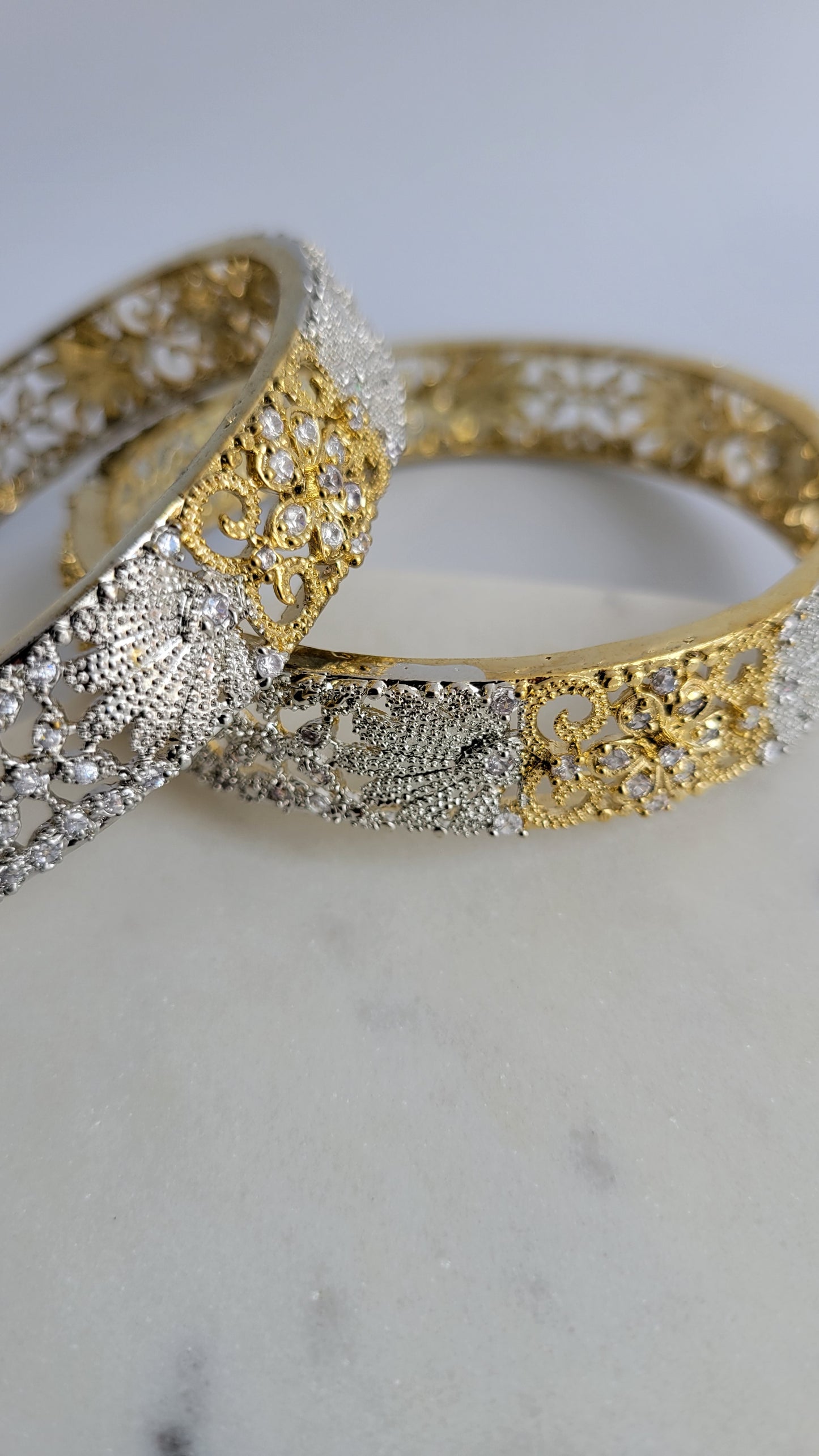 Gold and silver plated bangles