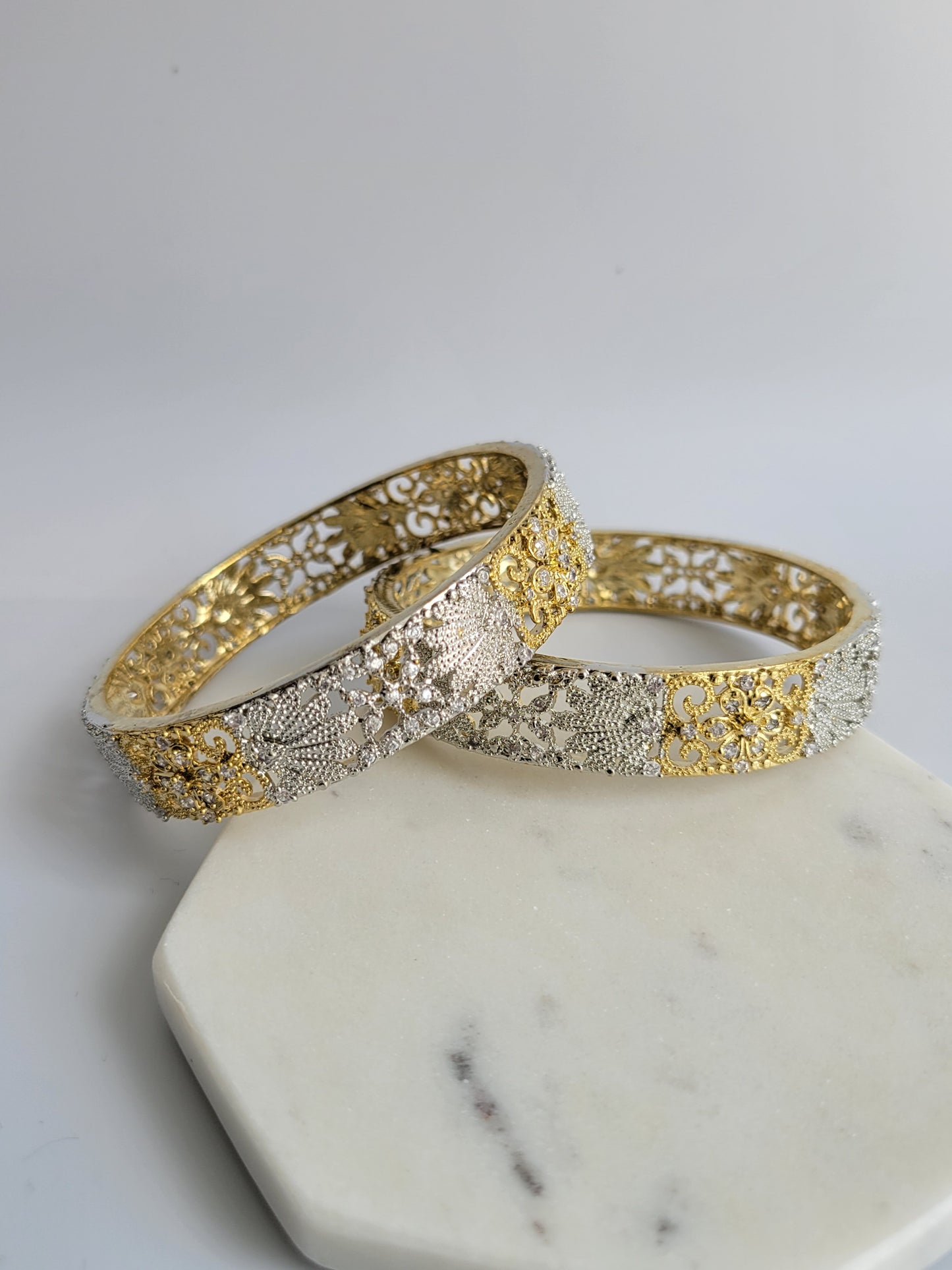 Gold and silver plated bangles