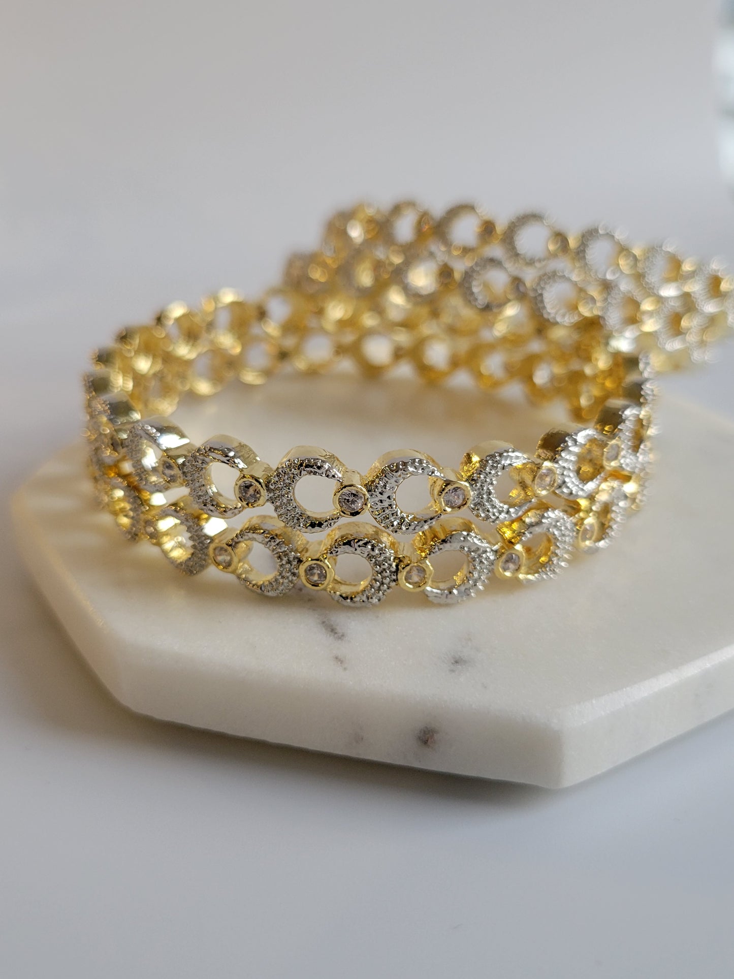 Gold plated crescent bangles