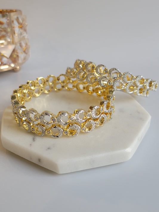 Gold plated crescent bangles