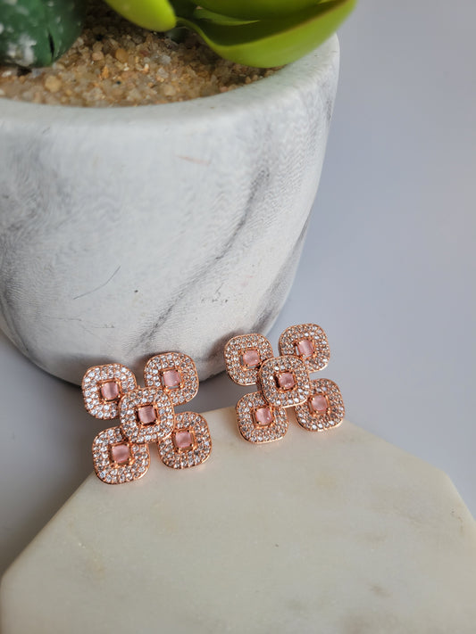 AD rose gold studs