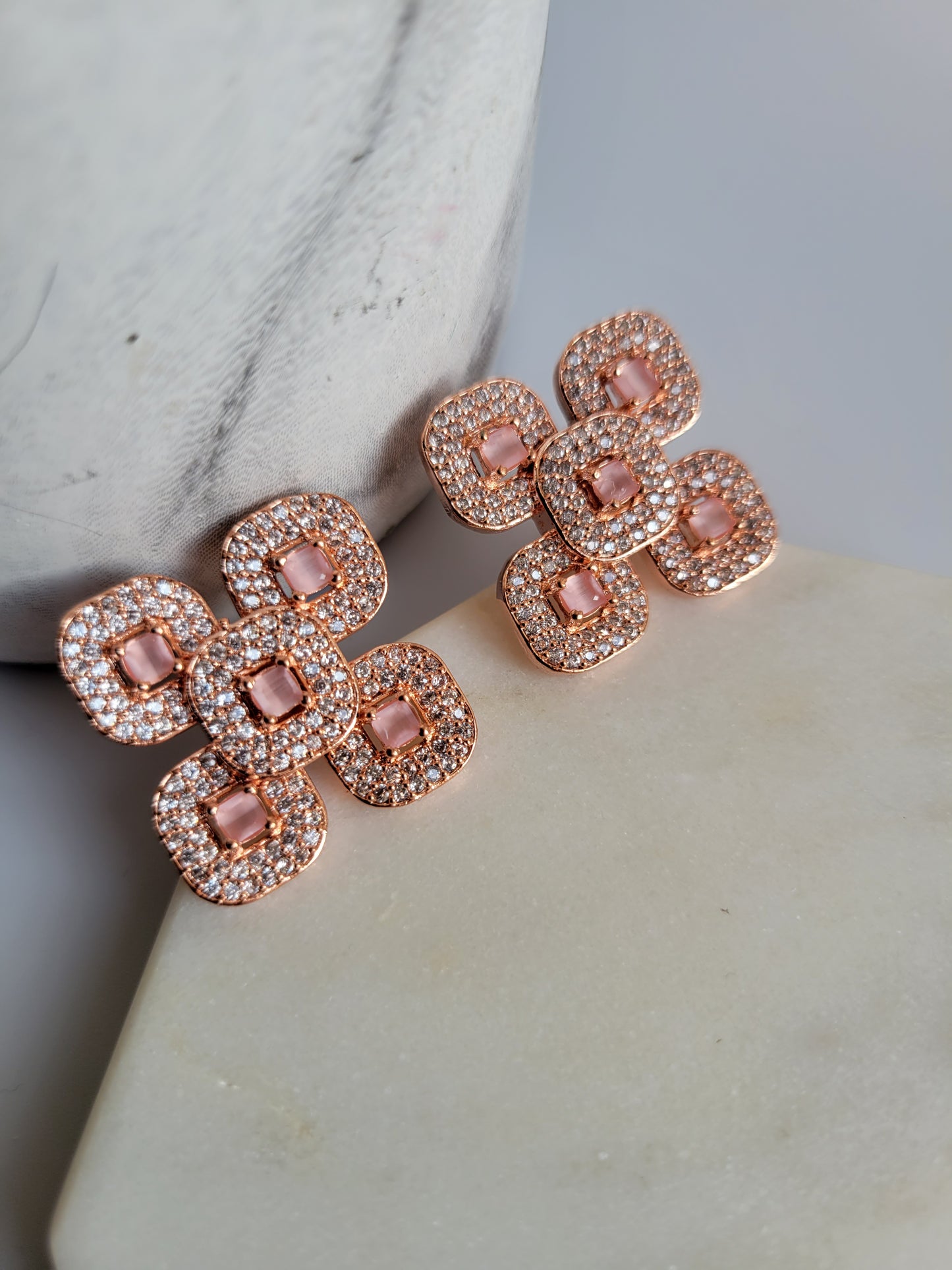 AD rose gold studs