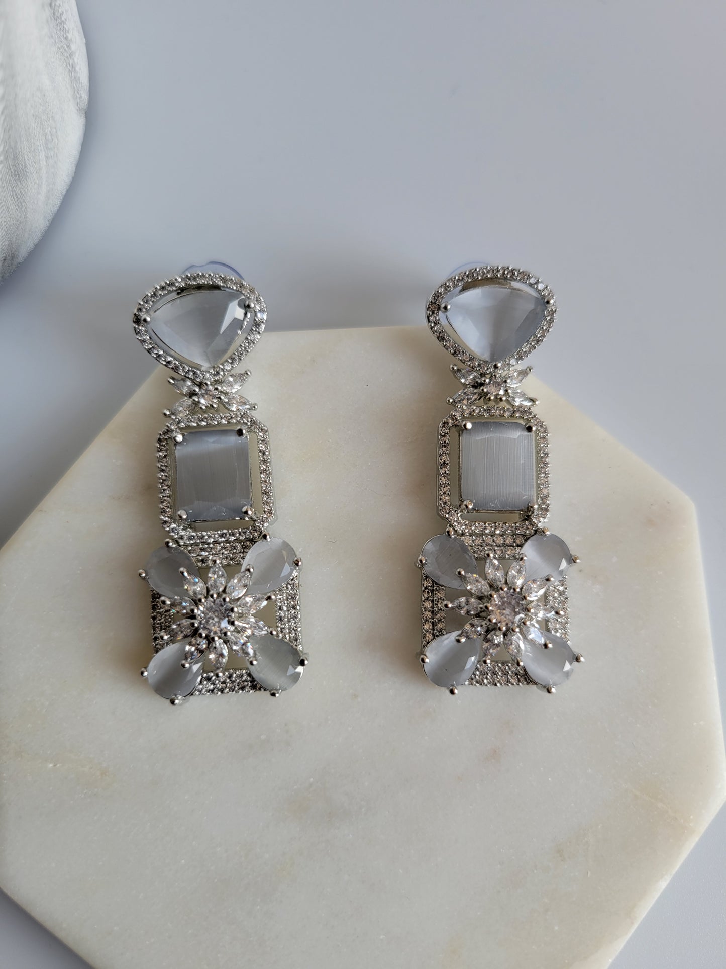 AD dangle earrings