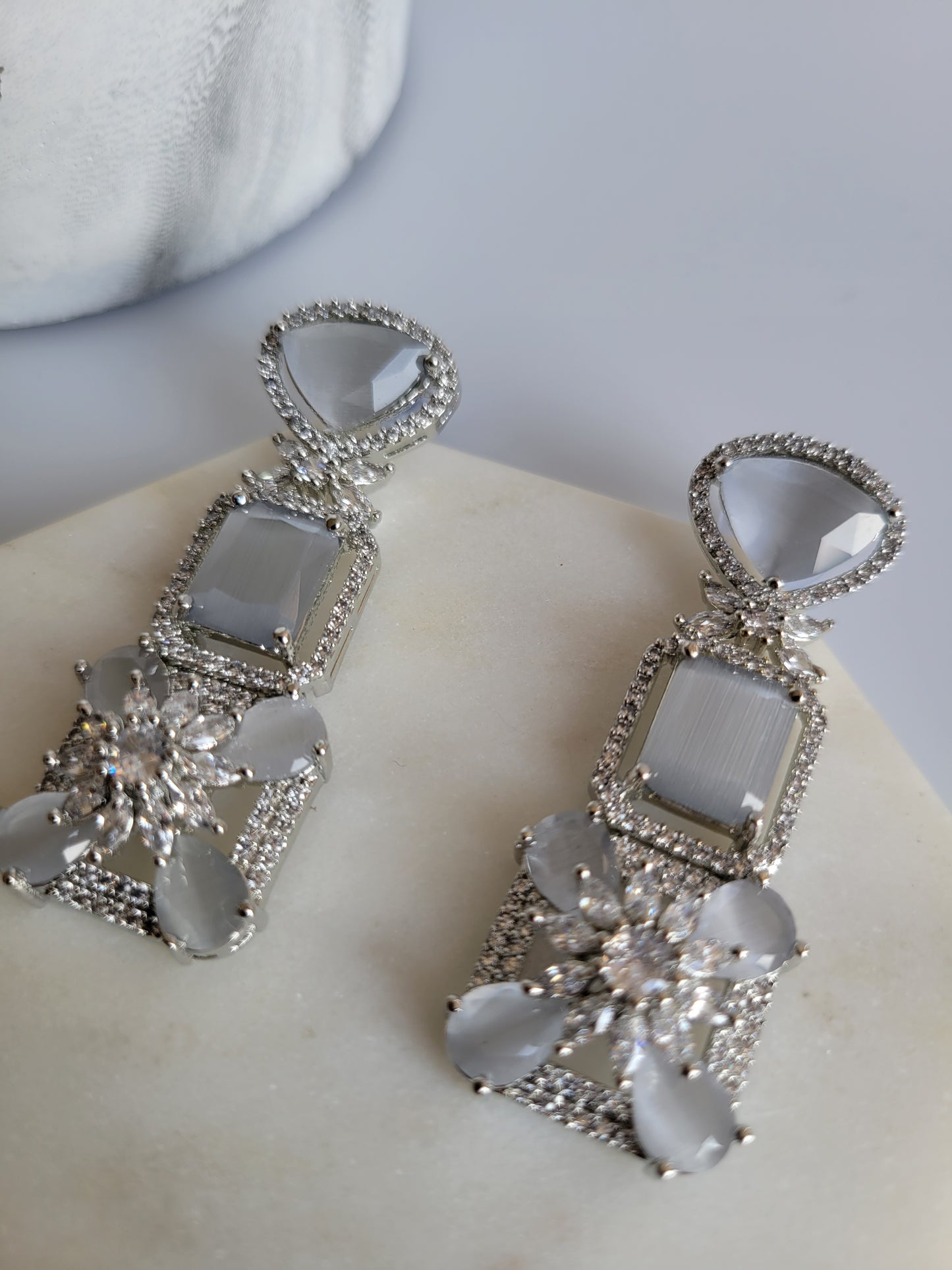 AD dangle earrings