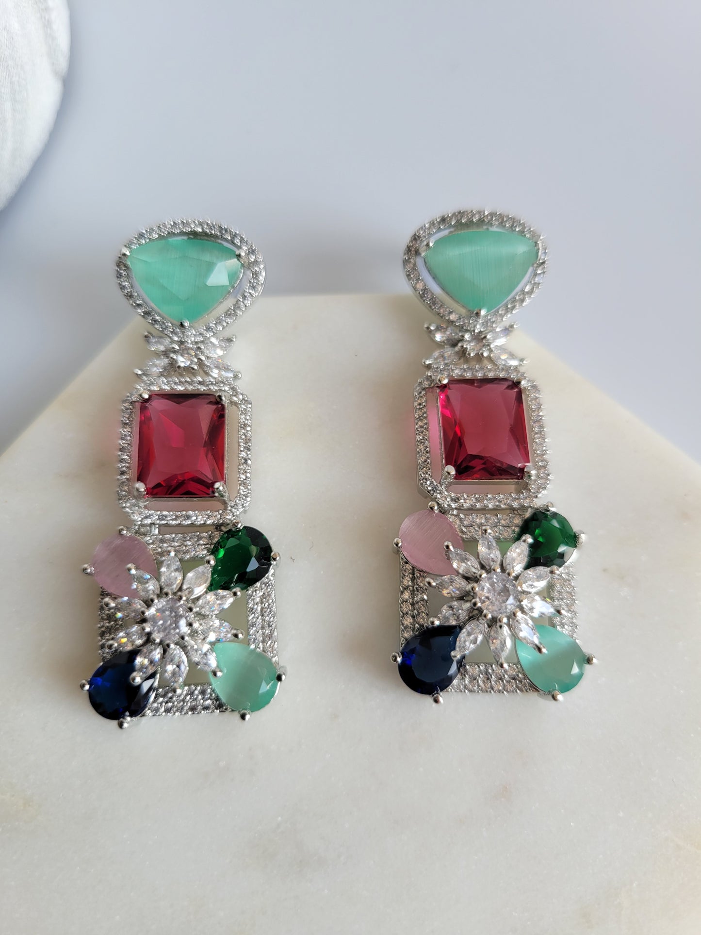 AD dangle earrings