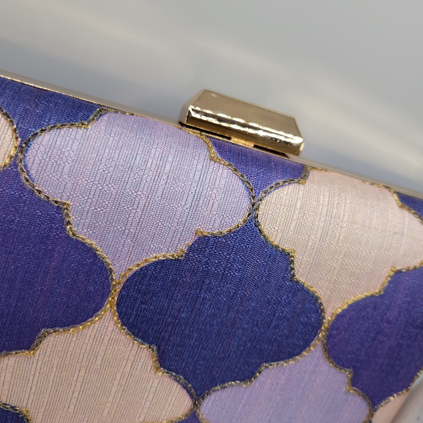 Raw silk clutch