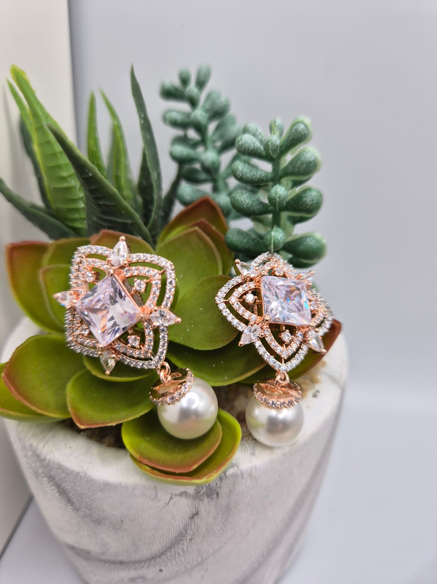 AD pearl earrings